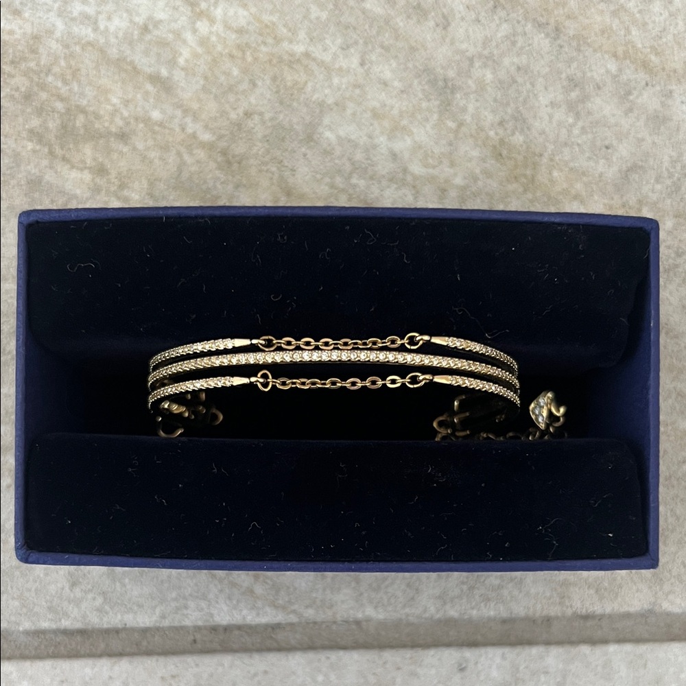 Swarovski Elegant Gold and Silver Women's Bracelet/ bangle
